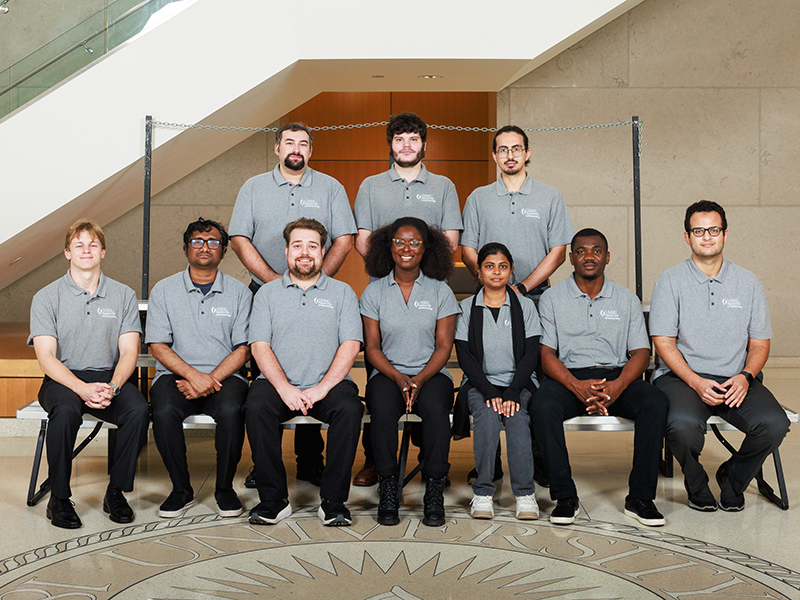 Group portrait of Cell and Molecular Biology PhD students in the School of Medicine. Seven on the front row are seated. Three on the back row are standing.